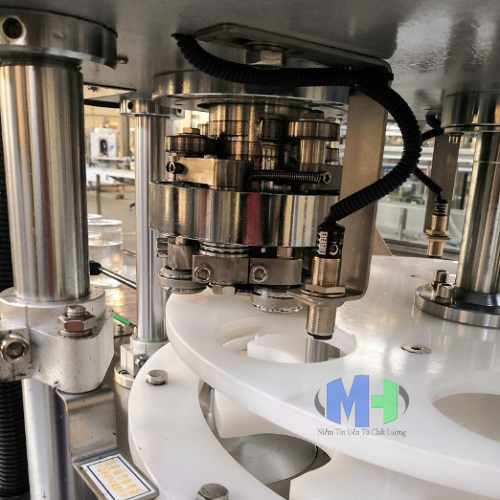 Máy viền mí lon tự động